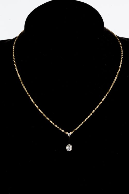 a foil back 07ct diamond pendant and chain - CATEGORY: ANTIQUE JEWELLERY - DATED 1960
