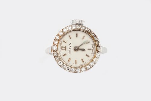 a platinum and diamond omega ring watch - CATEGORY: ANTIQUE JEWELLERY - DATED 1920