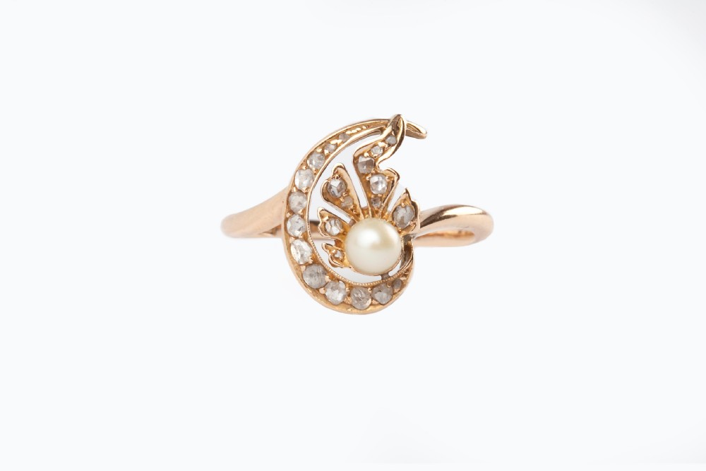 An antique Rose Cut Diamond and Cultured Pearl 18ct Gold Ring