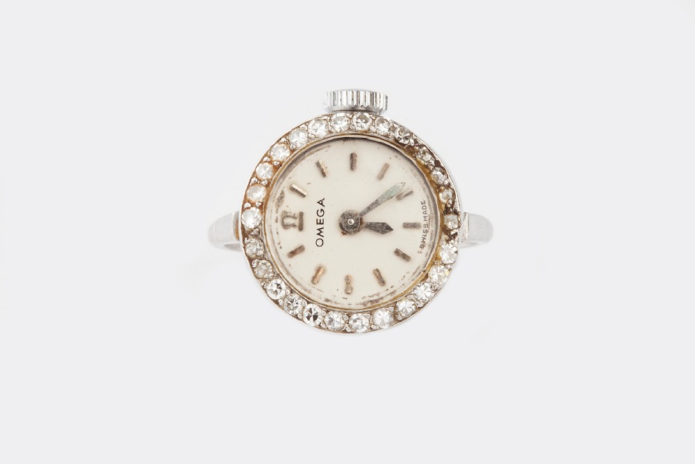 A Platinum and Diamond Omega Ring Watch 