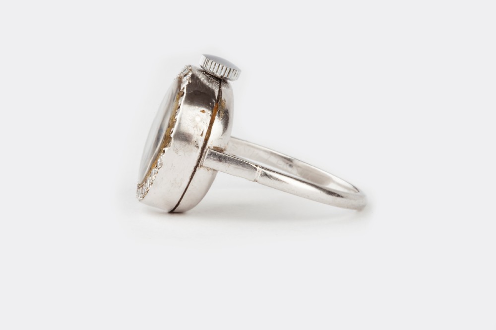 A Platinum and Diamond Omega Ring Watch  View II