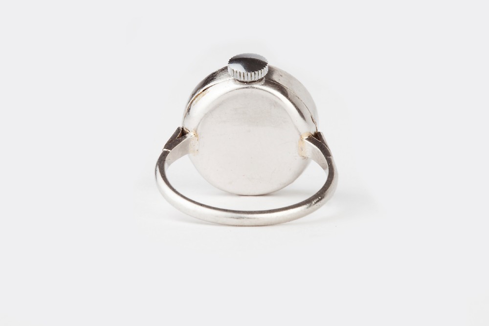 A Platinum and Diamond Omega Ring Watch  View III