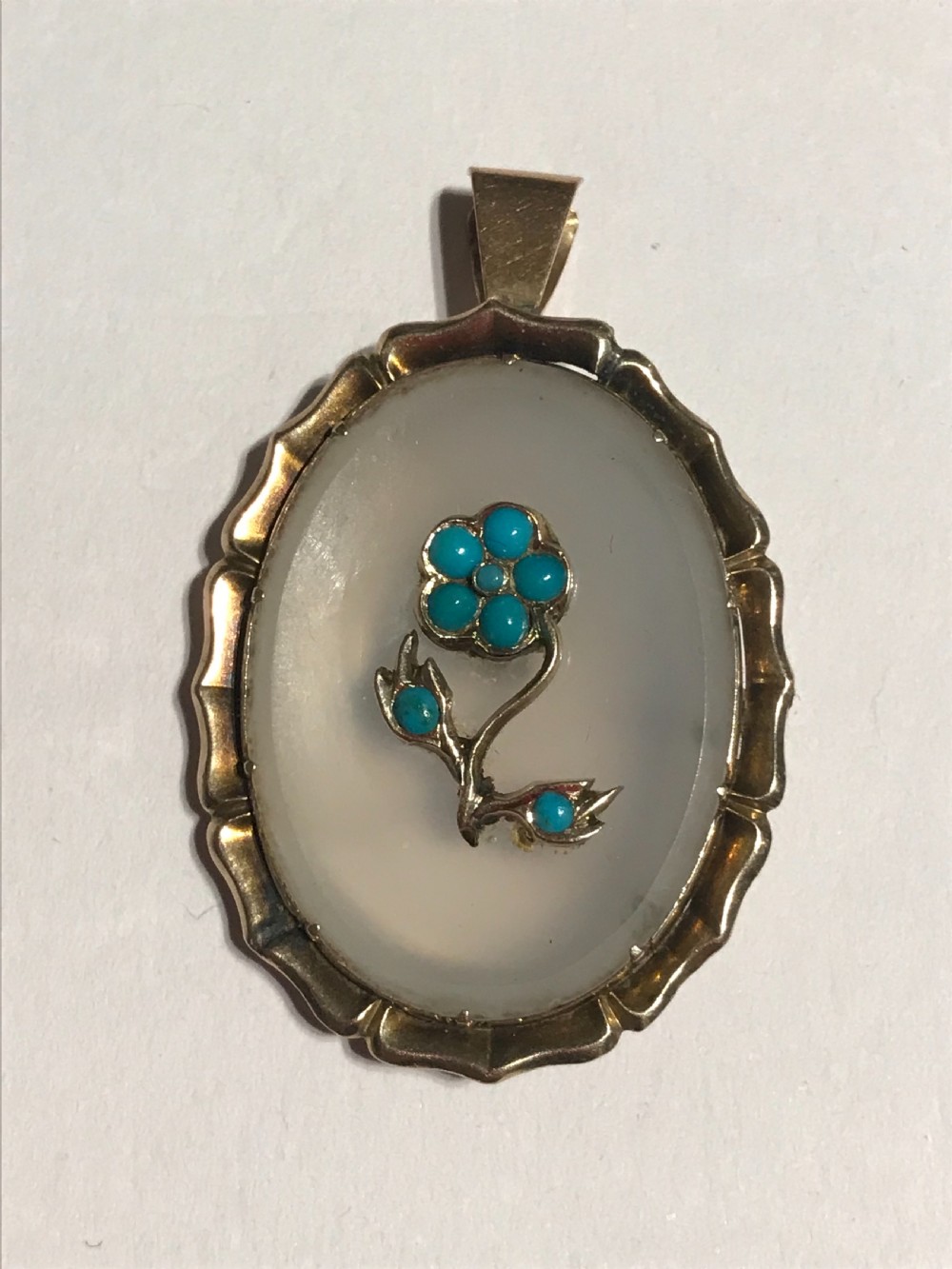 An Edwardian Turquoise and Gold Penant