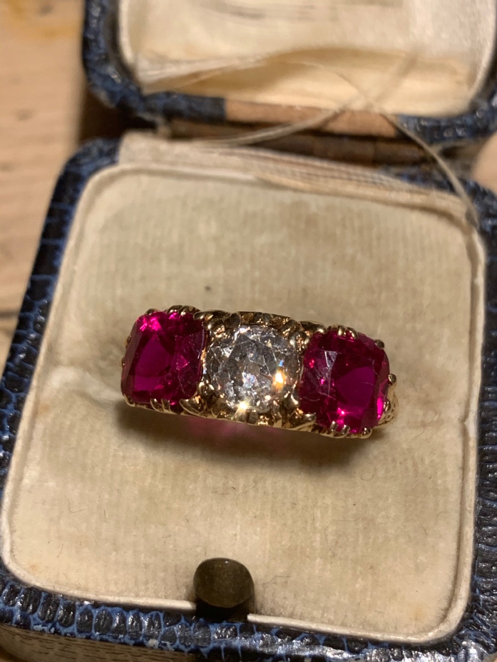 An Early 20th Century 1 Carat Old Cut Diamond & Synthetic Ruby Trilogy Ring