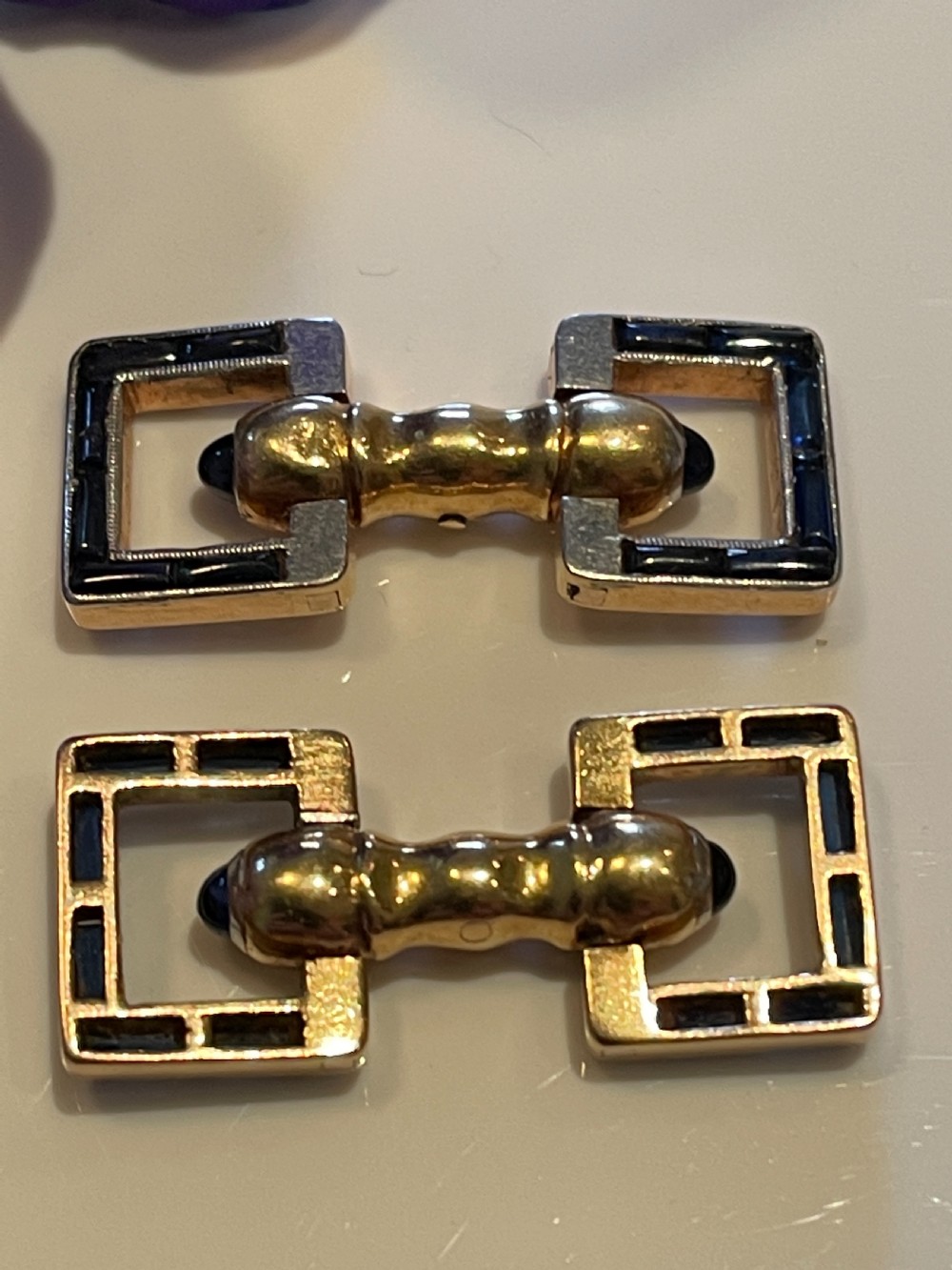 A pair of Art Deco style 18ct gold and sapphire geometric cufflinks presented in a velvet fitted box. View III
