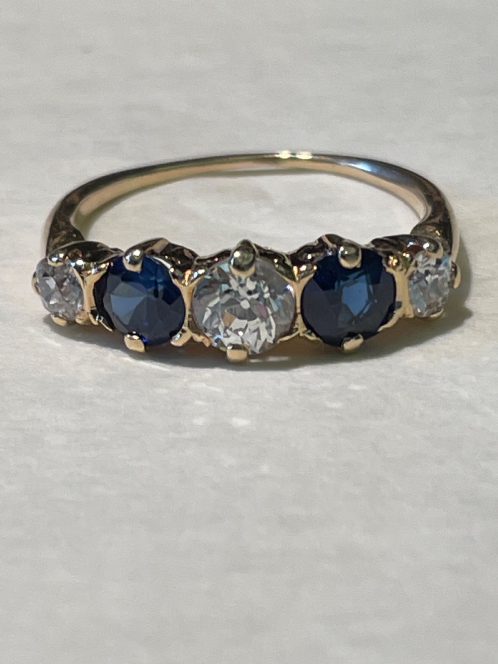 Early 20th Century Cornflower Blue Sapphire and Old European Diamond Five stone Ring View III