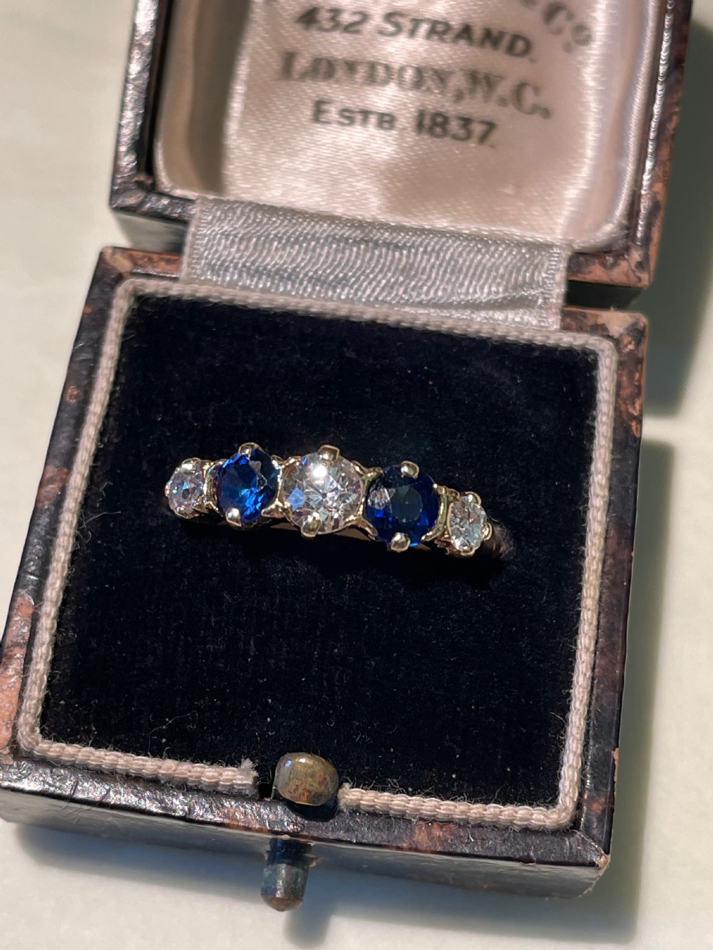 Early 20th Century Cornflower Blue Sapphire and Old European Diamond Five stone Ring View II