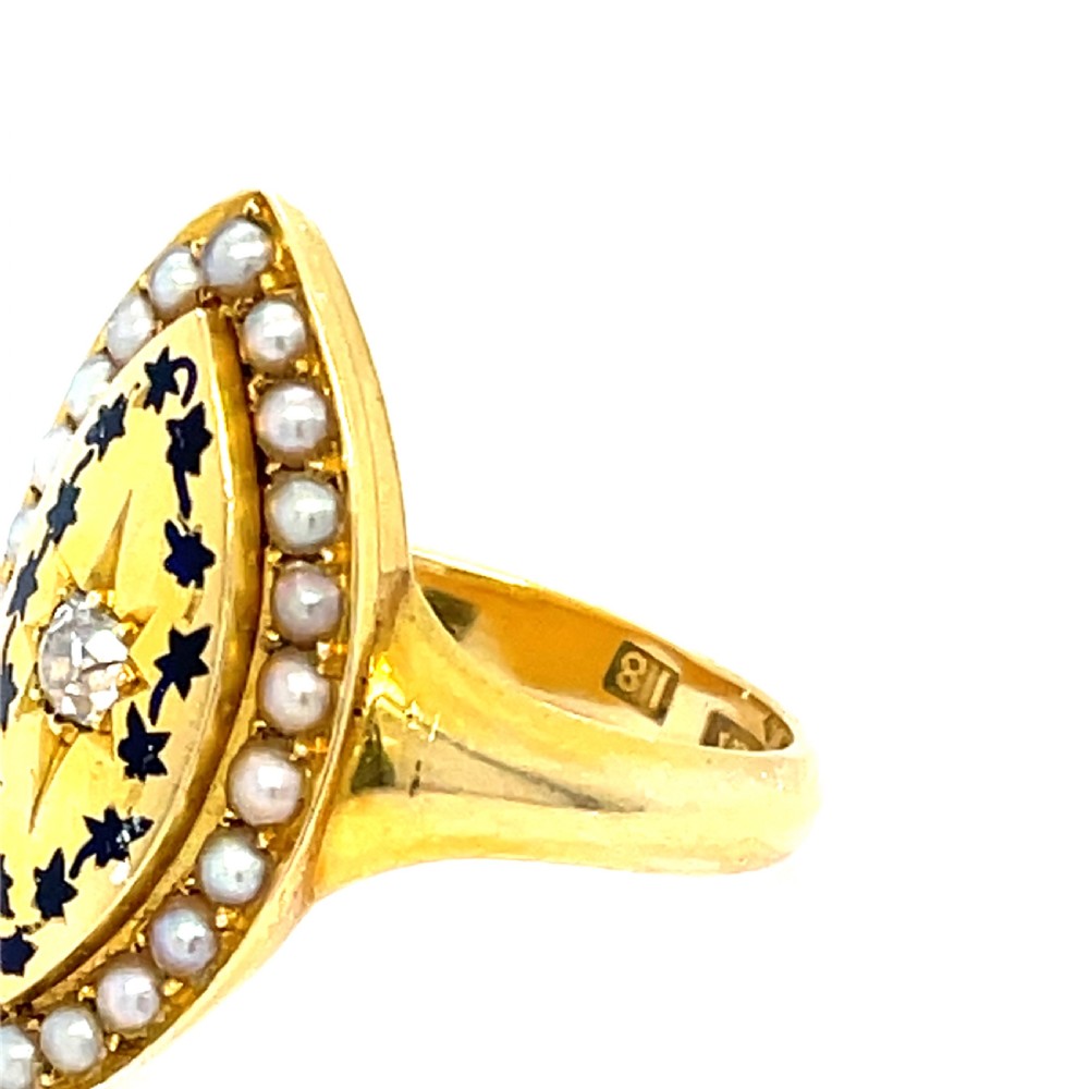An early Victorian 18ct yellow gold navette-shaped mourning ring featuring a central star-set diamond surrounded by black enamel foliage and a split pearl halo. View II