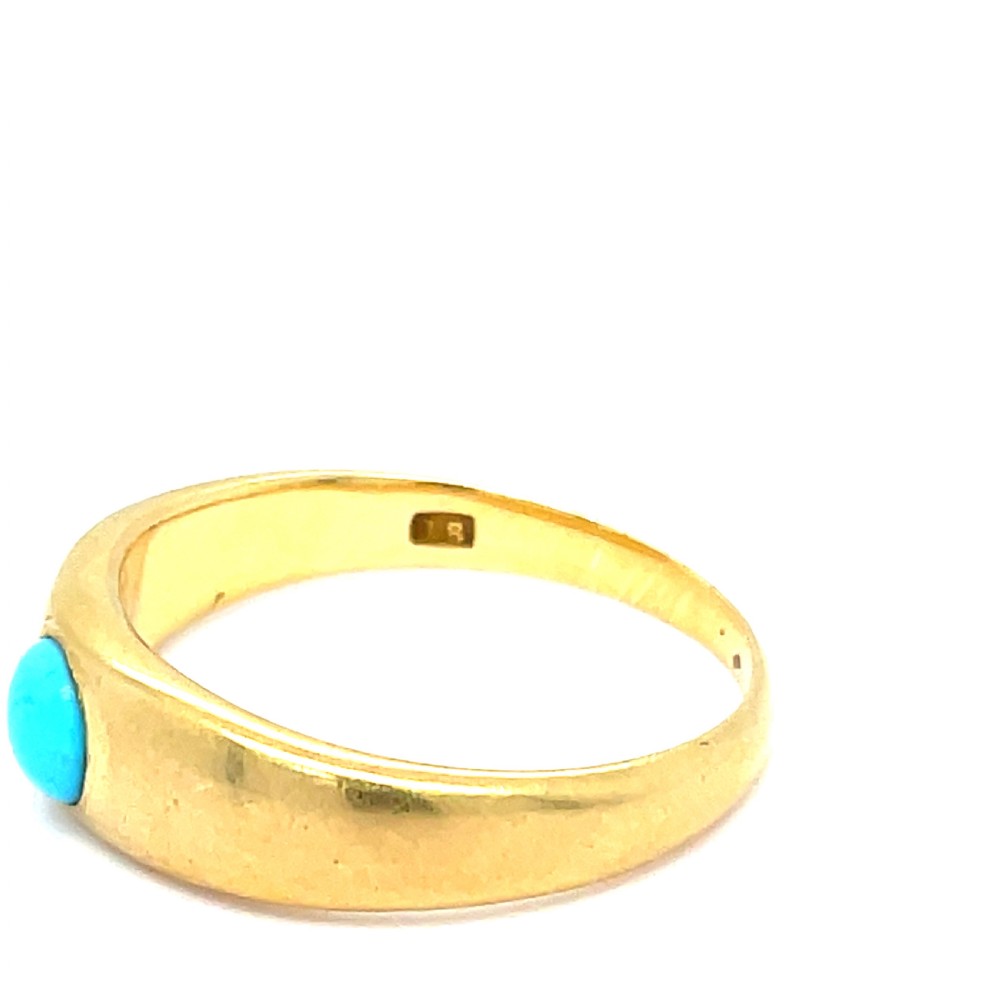 A smooth Victorian 18ct yellow gold band ring set with a central round cabochon turquoise stone. View III