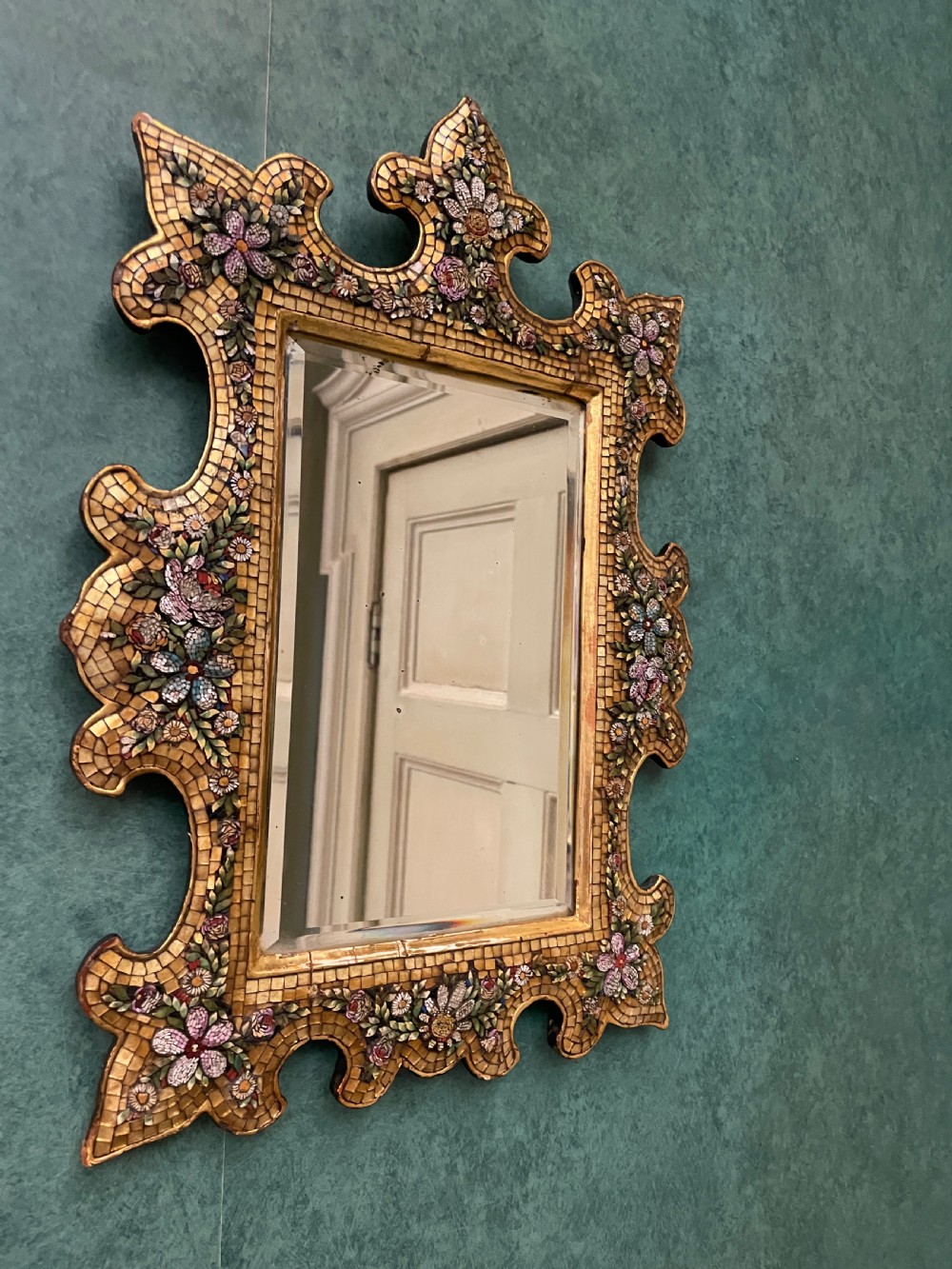 A 19th-century Italian micro mosaic wall mirror featuring a shaped gold tesserae frame decorated with colourful mosaic flowers around a rectangular mirror glass. View III