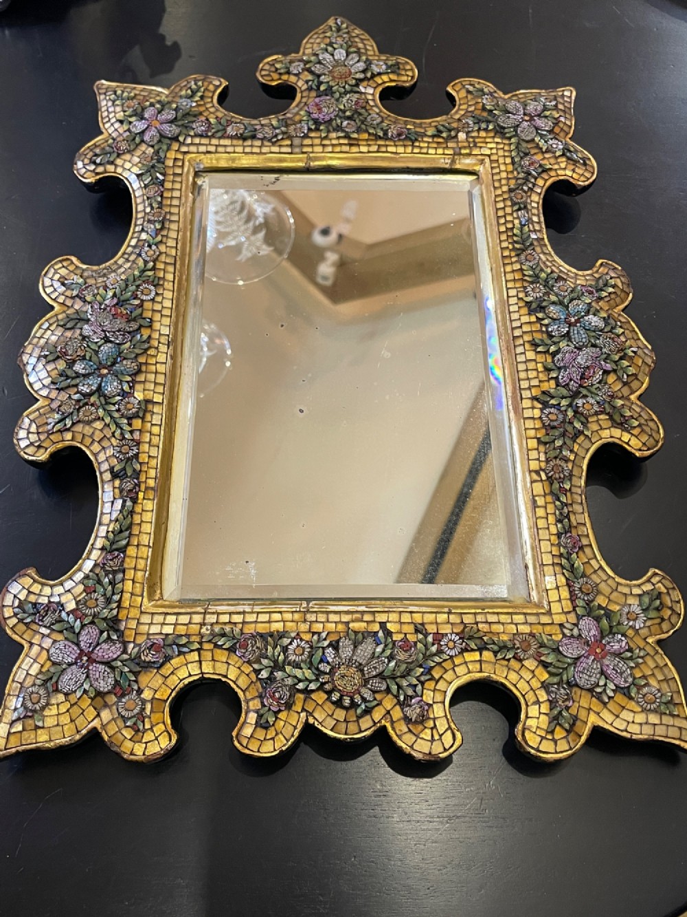 A 19th-century Italian micro mosaic wall mirror featuring a shaped gold tesserae frame decorated with colourful mosaic flowers around a rectangular mirror glass. View VIII