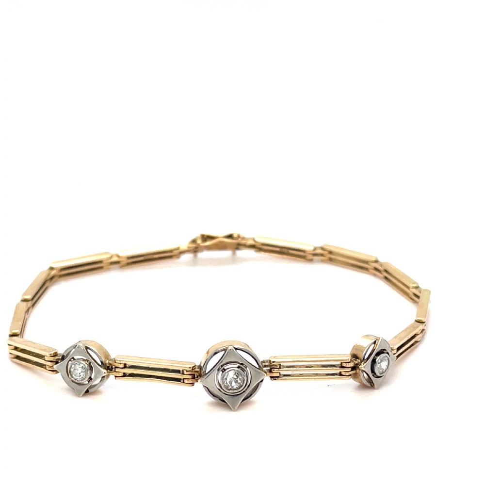 An Art Deco 14ct gold link bracelet featuring three geometric square-framed settings mounted with round diamonds. View II