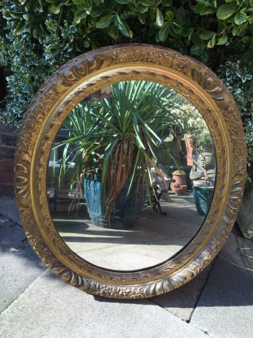 Late C18th Carved Gilt-wood and Gesso Oval-framed Mirror .