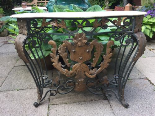 fig 1. Early C20th French wrought iron and bronzed tole-mounted marble top console table.