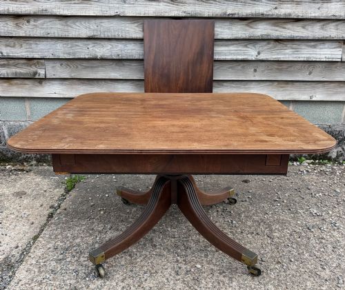 Early C19th late George III period mahogany patented action extending mahogany dining or breakfast table by Thomas Butler .