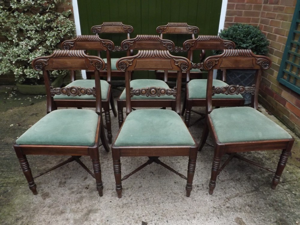 Set of 8 early C19th Regency period mahogany dining chairs.