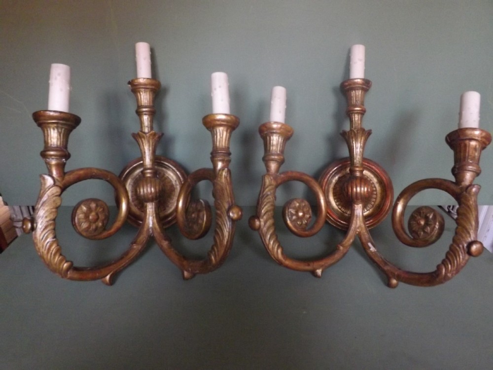 Pair of early C20th Italian carved gilt-wood 3 branch wall-lights.