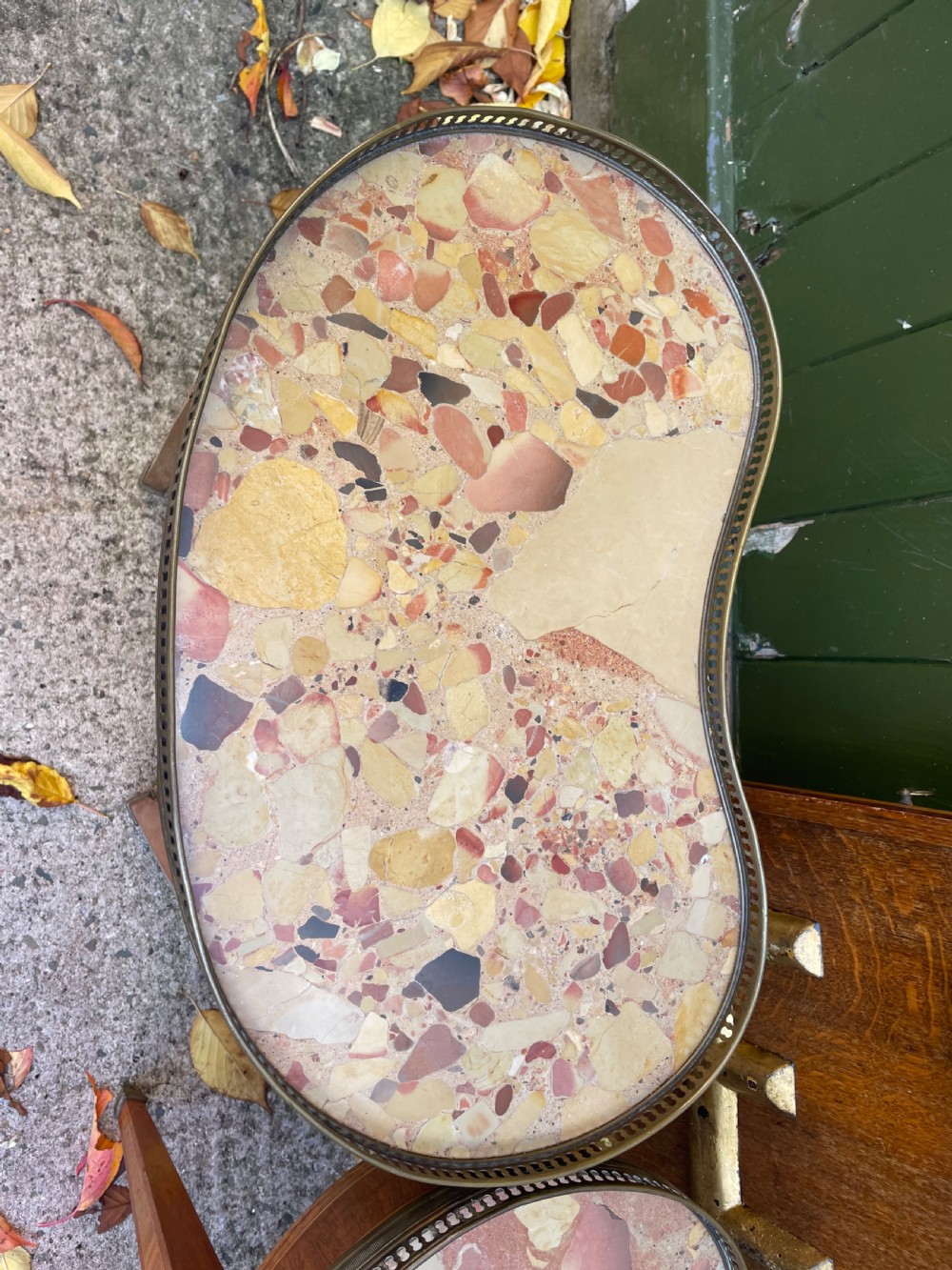 A pair of early twentieth-century French kidney-shaped side tables made from walnut and kingwood with brass galleried marble tops and tapered legs. View XI