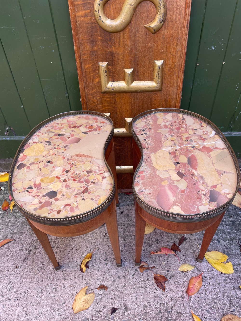 A pair of early twentieth-century French kidney-shaped side tables made from walnut and kingwood with brass galleried marble tops and tapered legs. View XIII