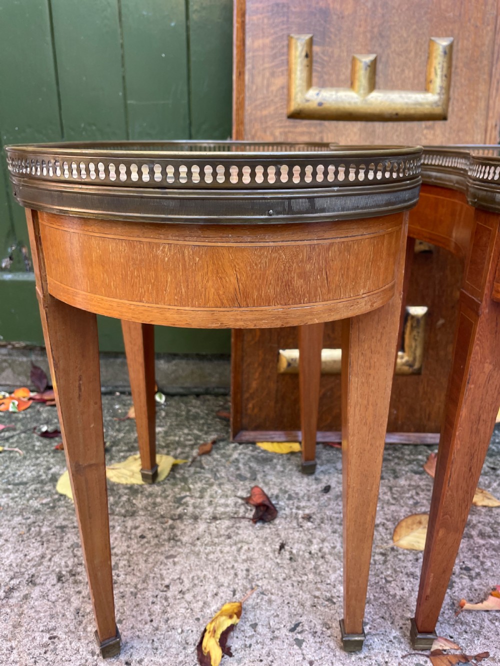 A pair of early twentieth-century French kidney-shaped side tables made from walnut and kingwood with brass galleried marble tops and tapered legs. View XVII