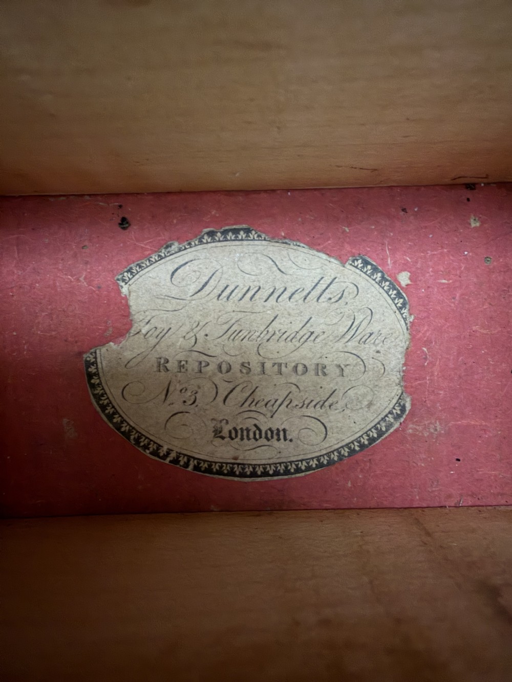A nineteenth-century rectangular rosewood box featuring a geometric specimen wood parquetry lid and a central keyhole. View XIV