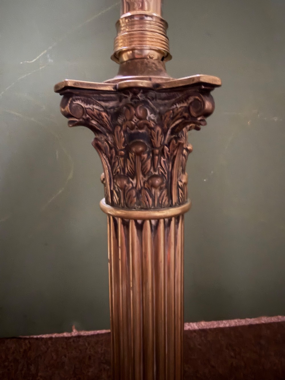 A pair of 19th-century brass table lamps featuring fluted classical Corinthian columns set on stepped square plinths. View V