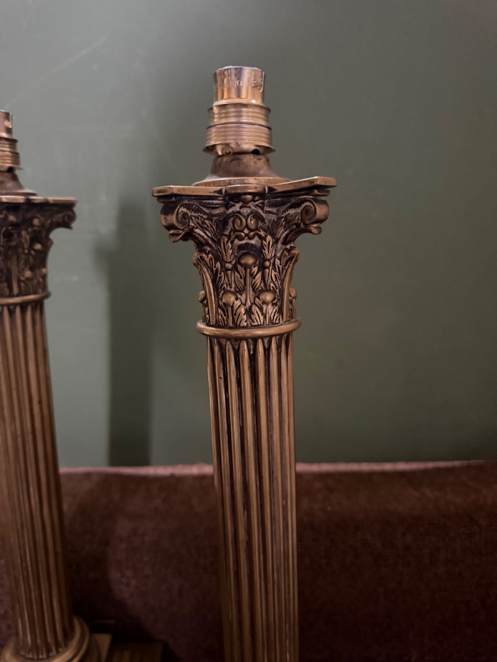 A pair of 19th-century brass table lamps featuring fluted classical Corinthian columns set on stepped square plinths. View IX
