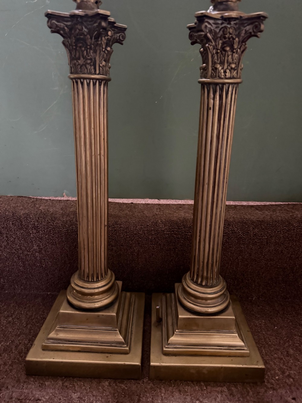 A pair of 19th-century brass table lamps featuring fluted classical Corinthian columns set on stepped square plinths. View XI