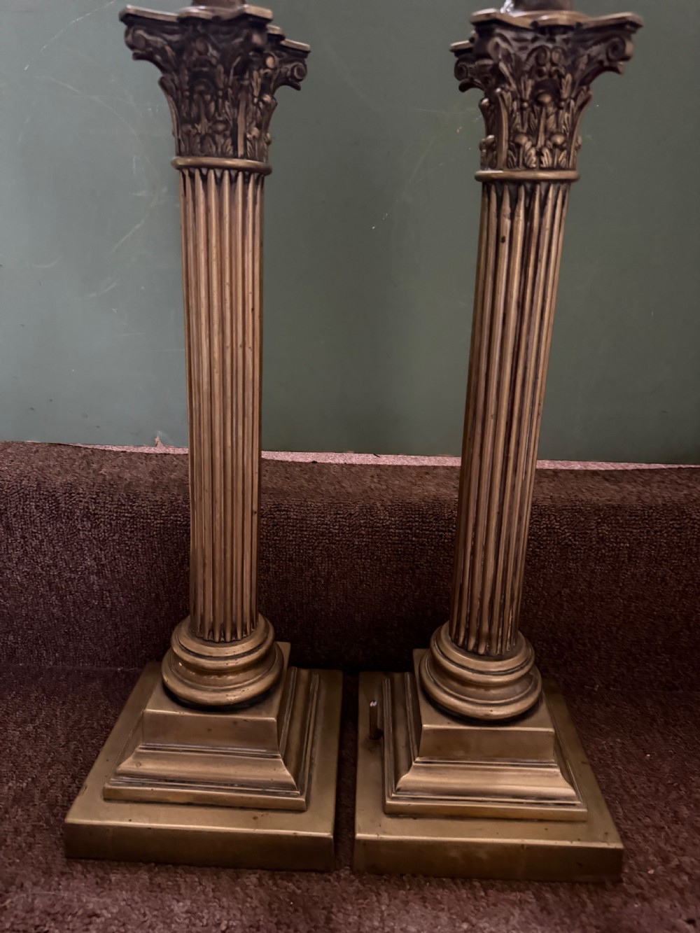 A pair of 19th-century brass table lamps featuring fluted classical Corinthian columns set on stepped square plinths. View XII