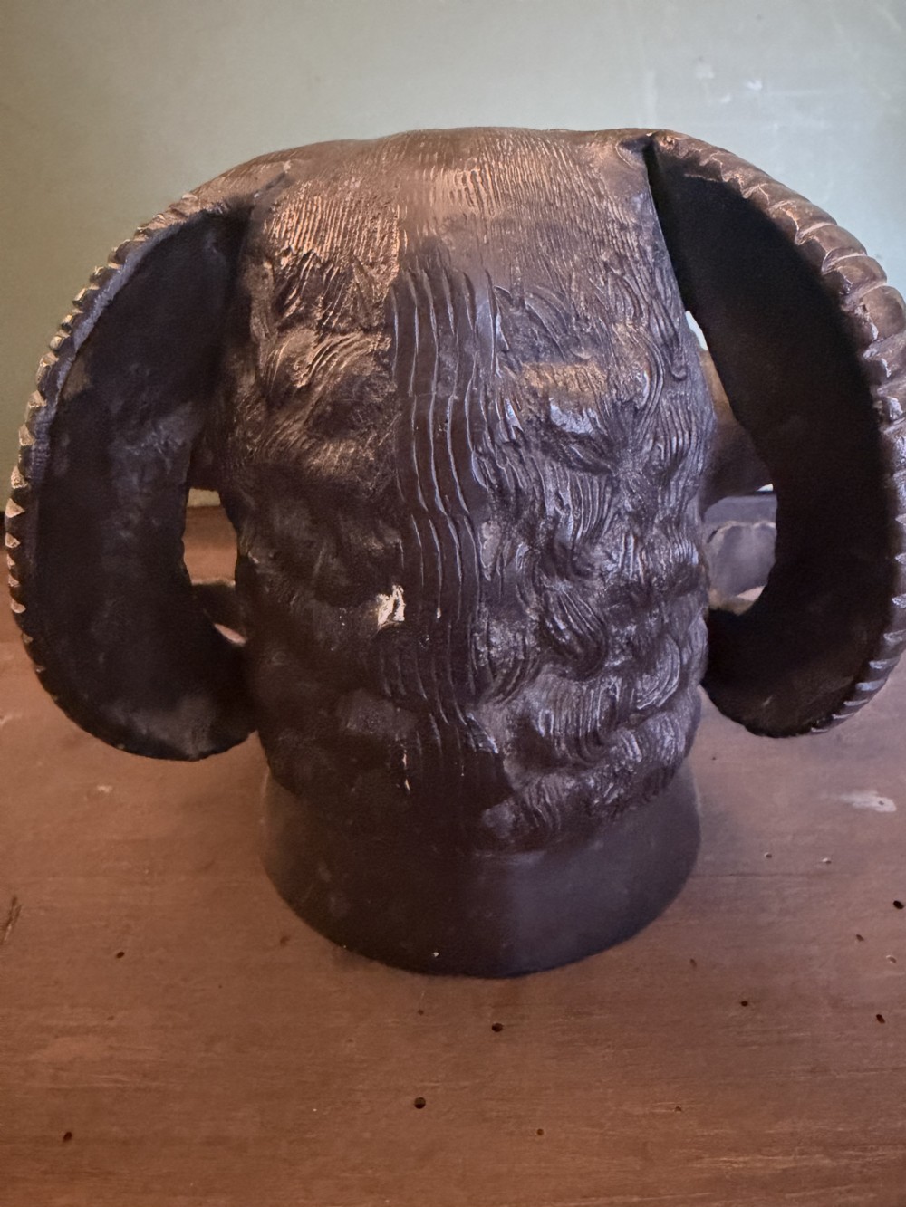 A late 19th-century cast bronze study featuring a ram head with detailed spiralled horns and textured fleece. View VII