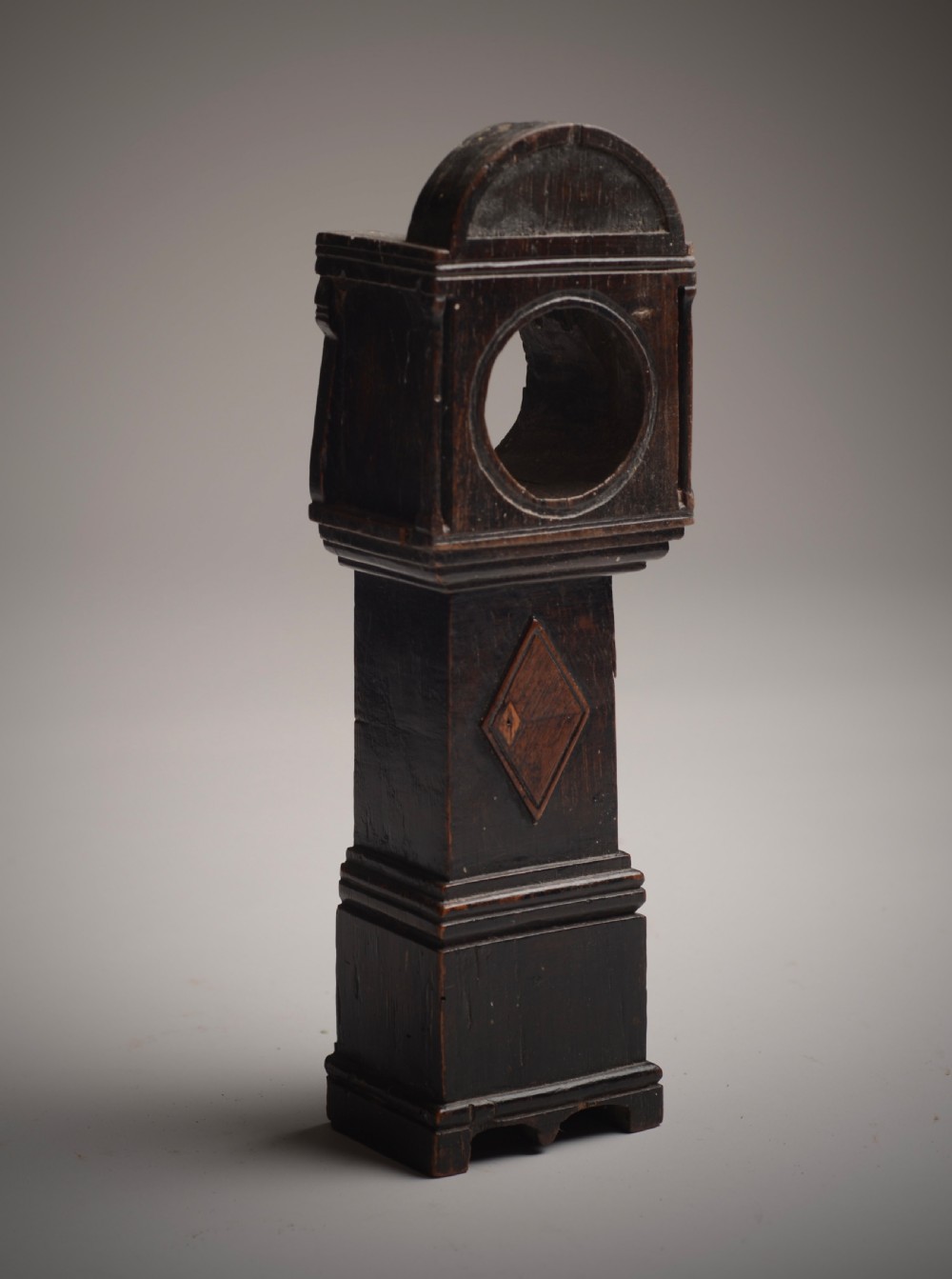 watch stand in the form of a long case clock