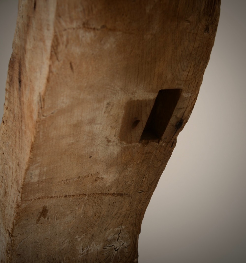 A hand-hewn oak Gothic window frame featuring a pointed arch apex and traditional pegged mortise joinery. View III