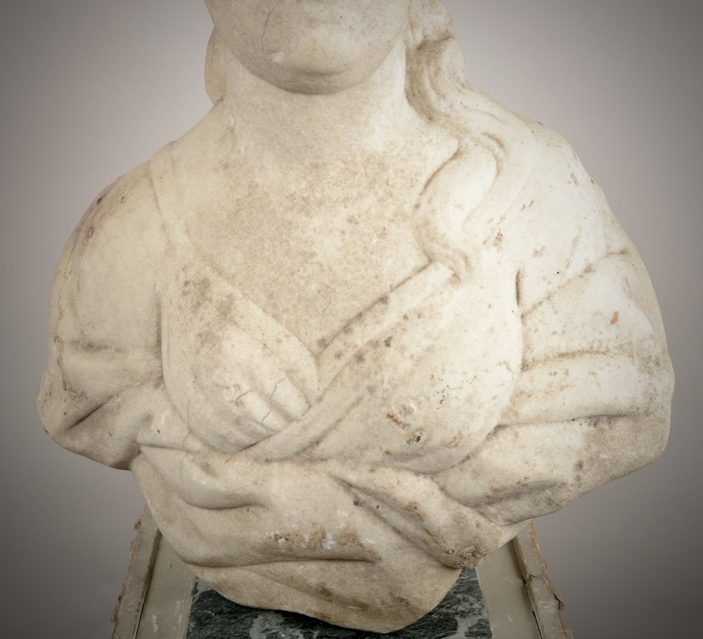 A carved off-white marble bust of a woman with classical draped clothing resting on a painted and gilded wooden pedestal. View III
