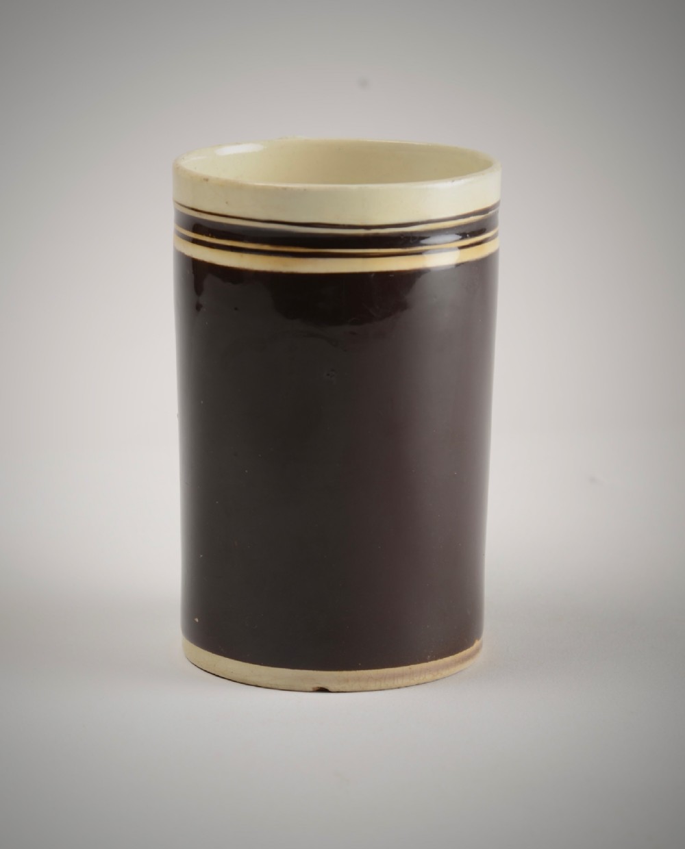 Creamware slip decorated mug. View II