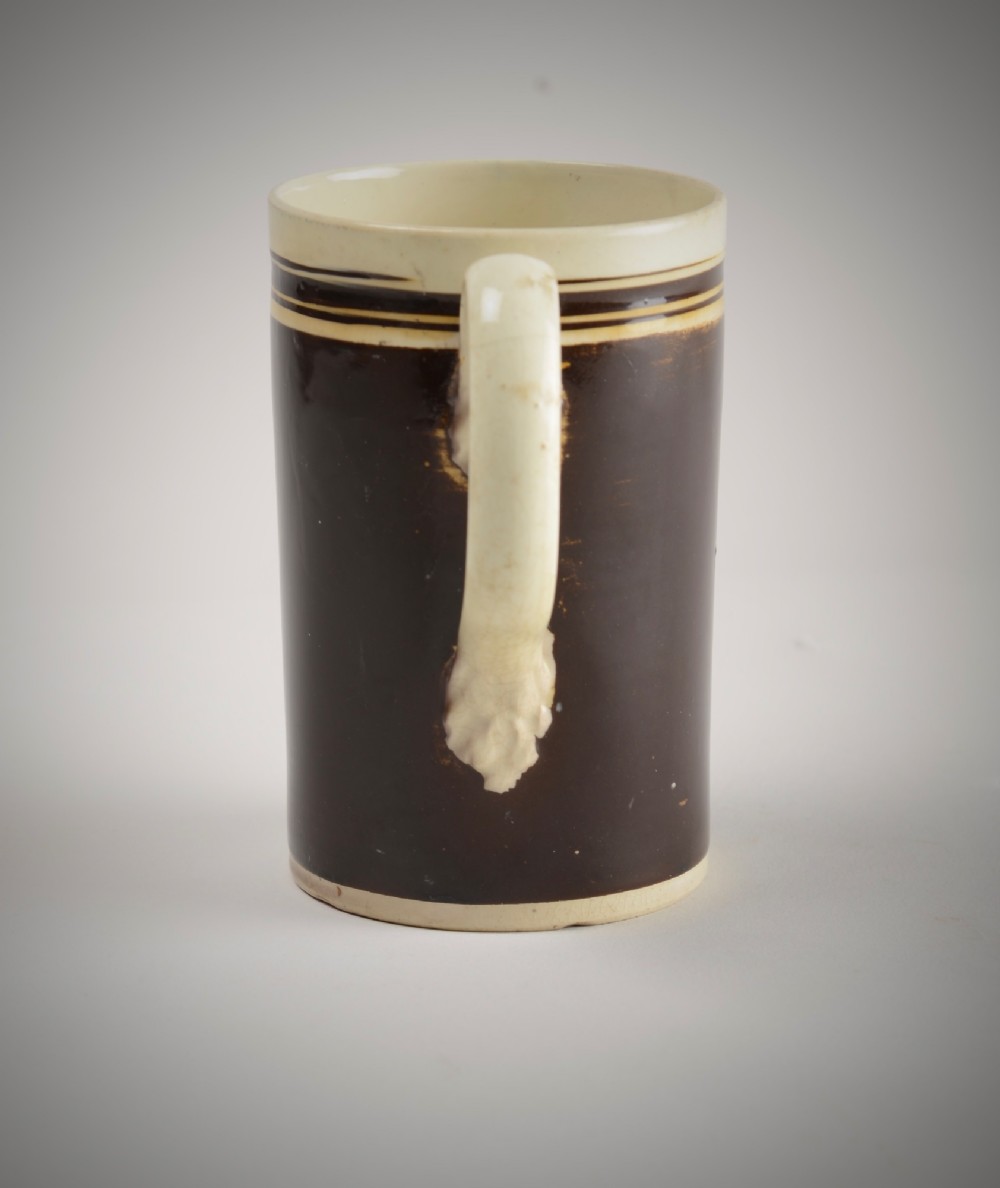 Creamware slip decorated mug. View III