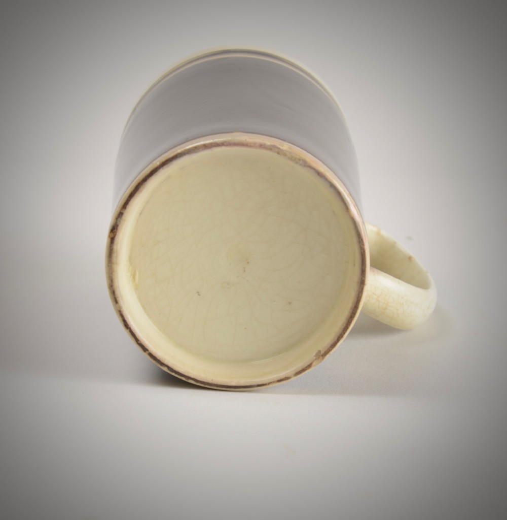 Creamware slip decorated mug. View IV