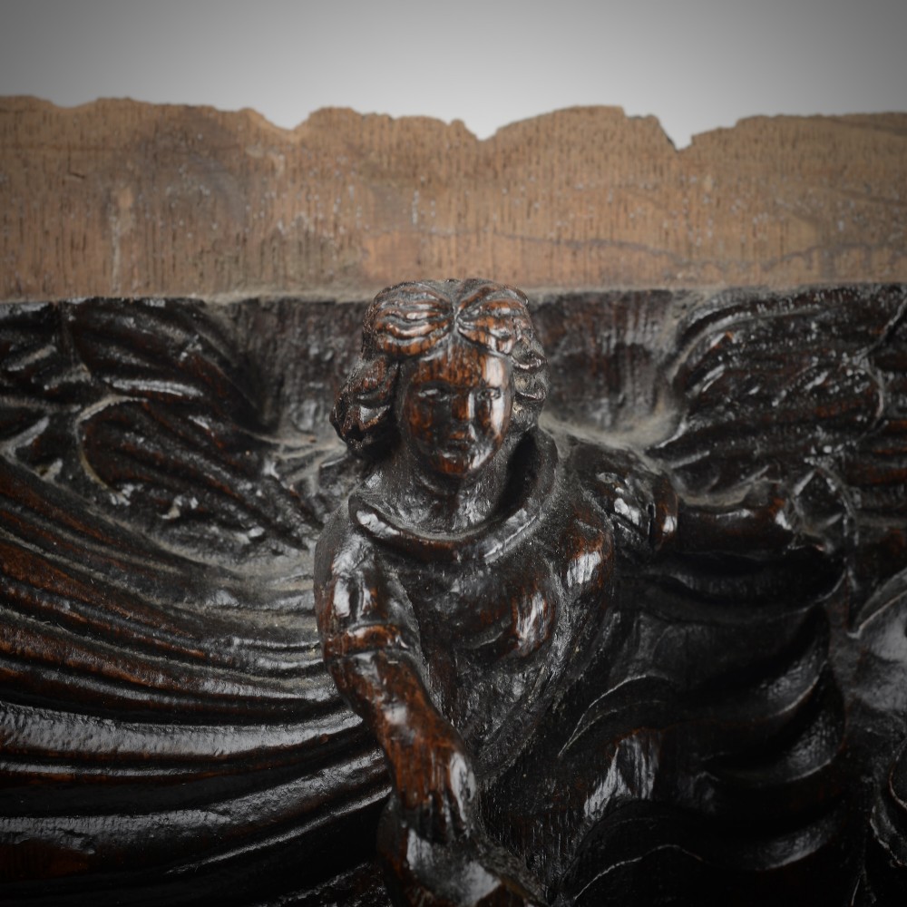 A square dark oak timber panel featuring a hand-carved relief depicting the biblical scene of Abraham and Isaac. View II