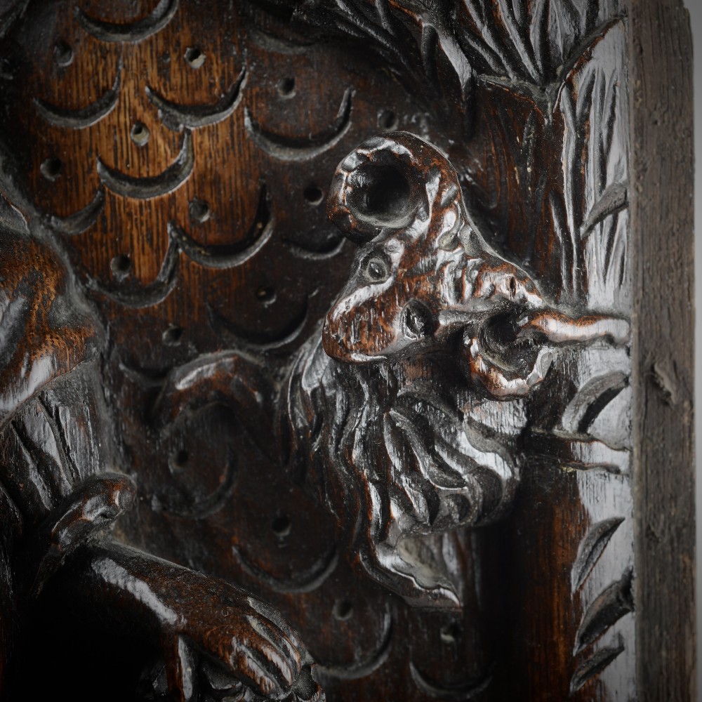 A square dark oak timber panel featuring a hand-carved relief depicting the biblical scene of Abraham and Isaac. View IV