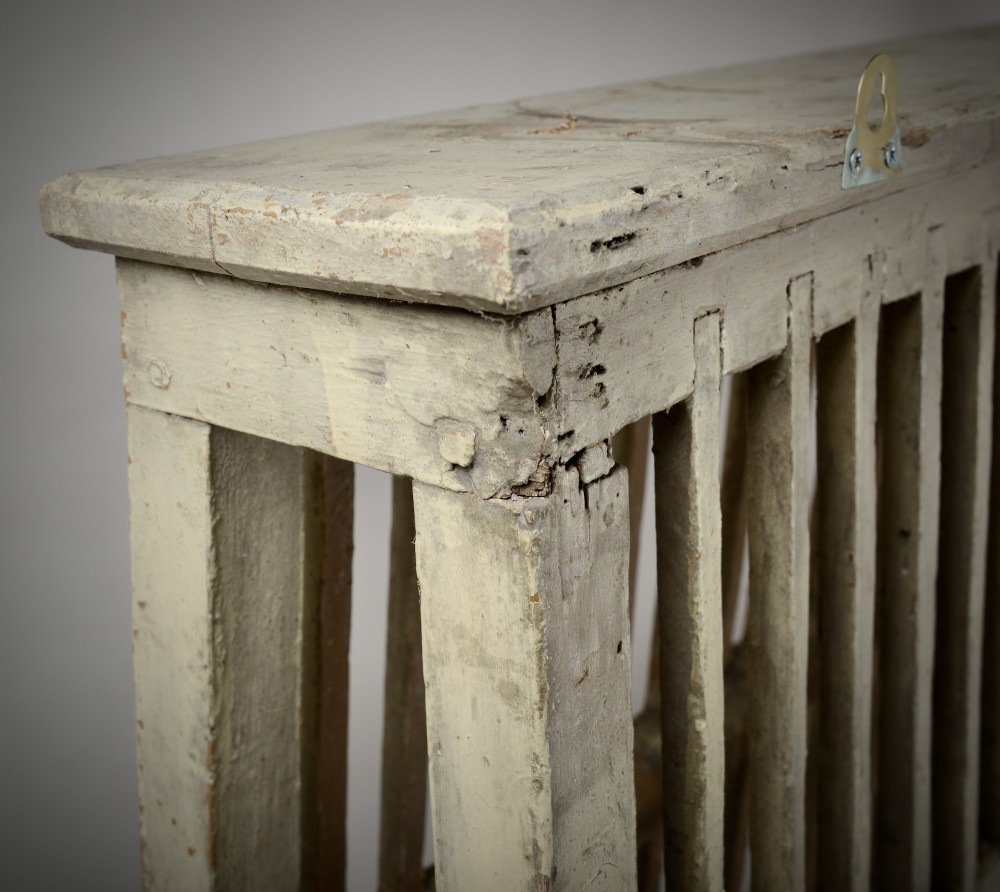 A two-tier painted wooden country house plate rack featuring a distressed off-white finish and vertical slotted spindles. View IV