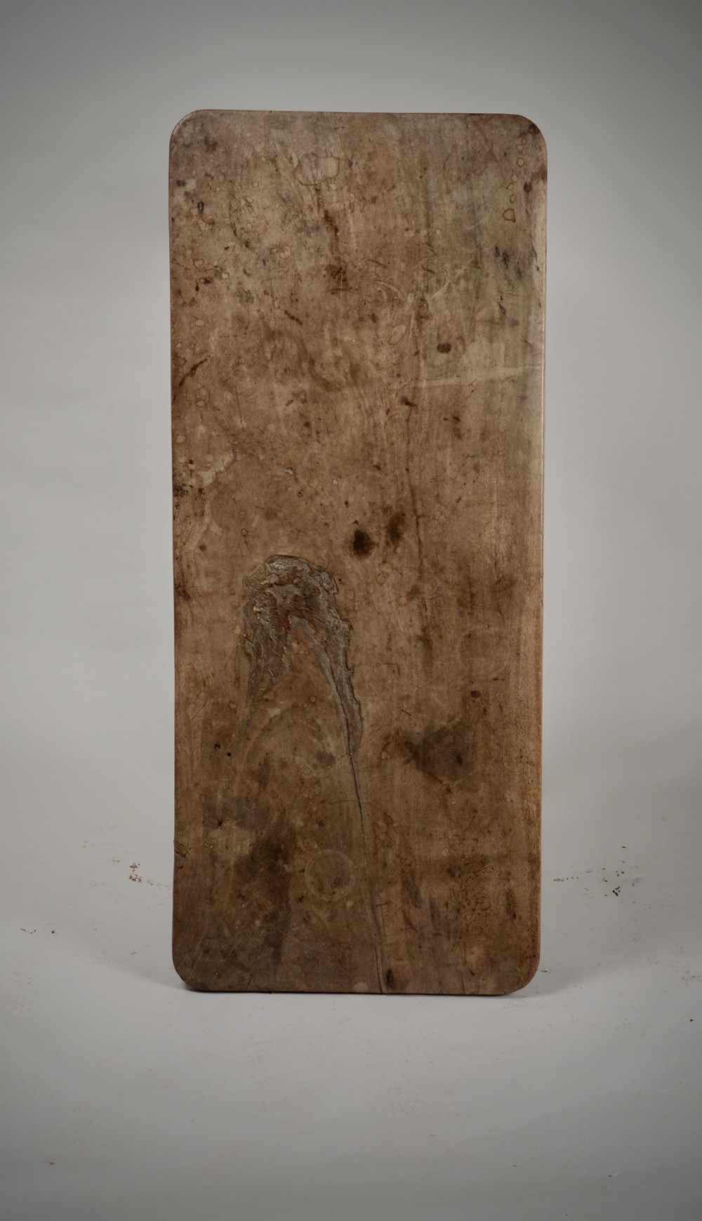 An antique rustic wooden tavern table featuring a rectangular plank top resting on an X-frame trestle base joined by a turned central stretcher. View V