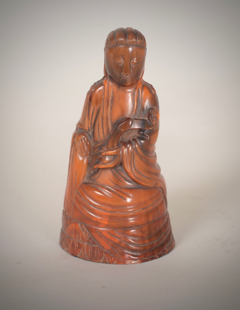 Horn Guanyin carving.