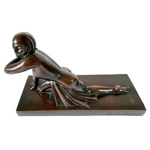 An Art Deco dark patinated bronze sculpture depicting a stylised female figure resting on an integrated rectangular bronze base. View IV
