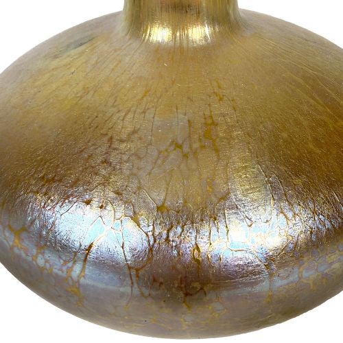 A tall Art Nouveau iridescent glass vase featuring a round bulbous base, an elongated slender stem, and a flared scalloped rim. View IV
