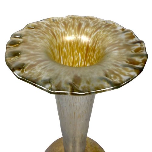 A tall Art Nouveau iridescent glass vase featuring a round bulbous base, an elongated slender stem, and a flared scalloped rim. View V