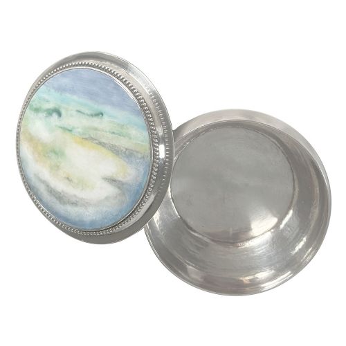 A circular Arts and Crafts sterling silver box featuring a hand-painted enamel landscape plaque inset on the lid with a beaded silver border. View III