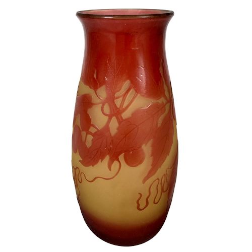 An Art Nouveau DArgental cameo glass vase featuring red acid-etched botanical leaf and berry motifs over a frosted yellow ground. View IV