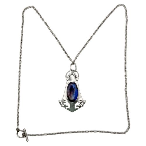 An Arts and Crafts sterling silver pendant featuring stylized Celtic knotwork and a central oval blue enamel cabochon suspended from a fine silver chain. View II