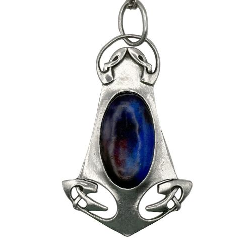 An Arts and Crafts sterling silver pendant featuring stylized Celtic knotwork and a central oval blue enamel cabochon suspended from a fine silver chain. View III