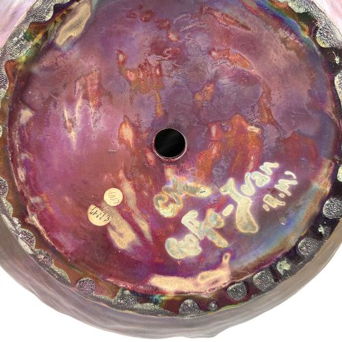 An Art Nouveau ceramic planter featuring an iridescent bronze and purple lustre glaze with a sculpted reclining female figure along undulating wave forms. View VIII