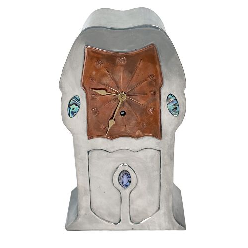 An Arts and Crafts pewter mantel clock featuring a square copper dial with Roman numerals and three iridescent abalone shell cabochon inlays. View II